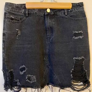 Distressed black denim mini. Nasty Gal.